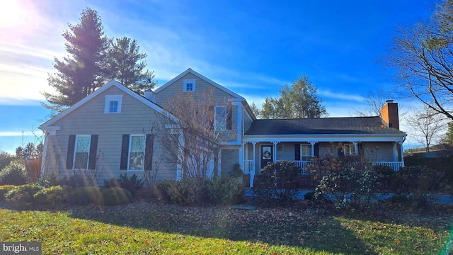 front of property featuring covered porch