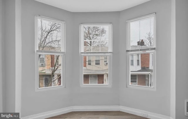 interior space with hardwood / wood-style flooring