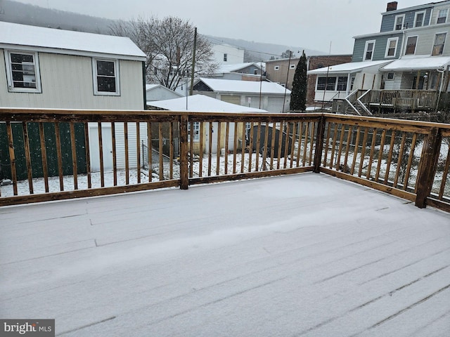 view of snow covered deck