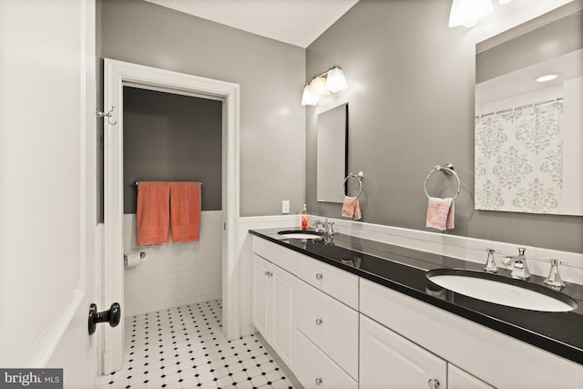 bathroom with vanity and tile patterned floors