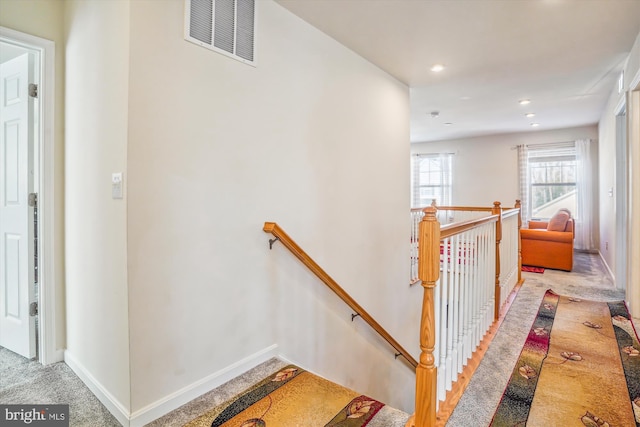 stairs with carpet floors