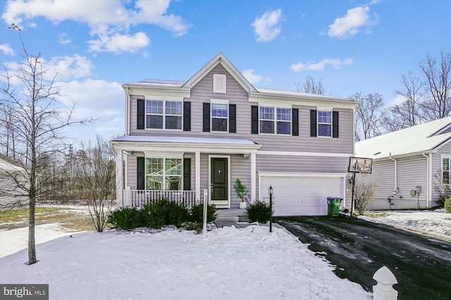 front of property featuring a porch and a garage