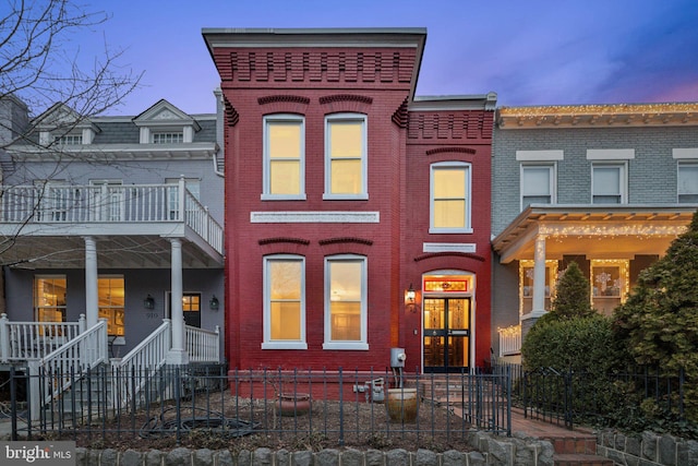 townhome / multi-family property featuring a balcony