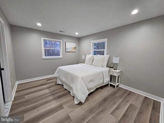 bedroom with hardwood / wood-style floors