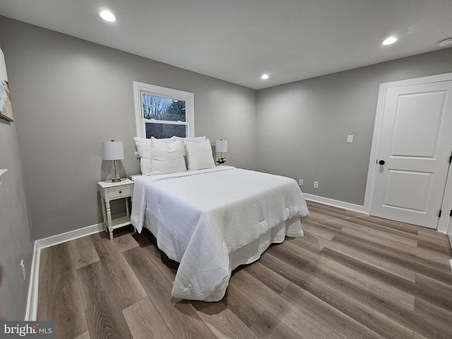 bedroom featuring hardwood / wood-style flooring