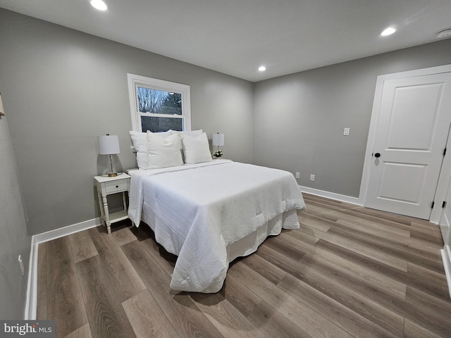 bedroom featuring hardwood / wood-style floors