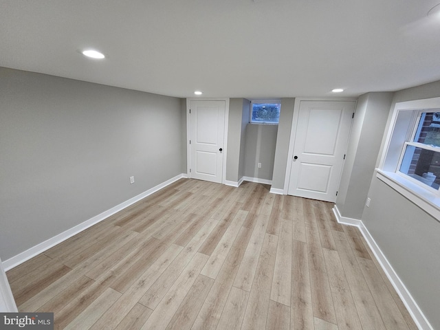 basement with light wood-type flooring