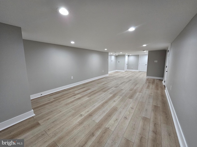 basement featuring light wood-type flooring