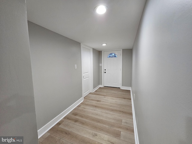 doorway to outside with light hardwood / wood-style floors