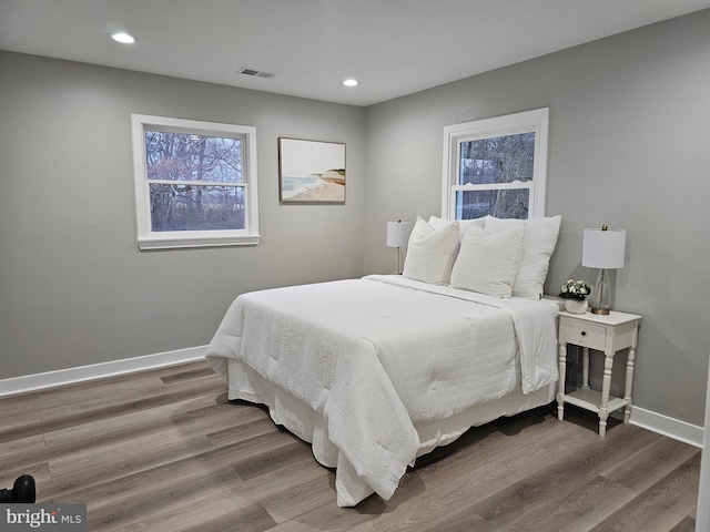 bedroom featuring hardwood / wood-style floors