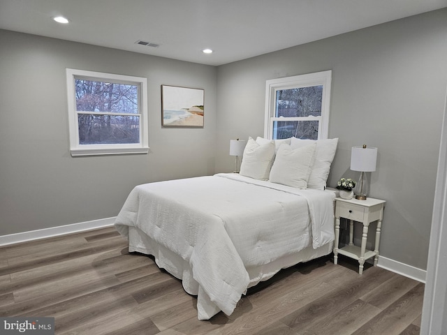 bedroom featuring hardwood / wood-style flooring