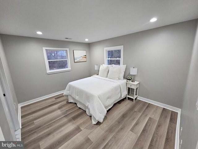 bedroom with light wood-type flooring