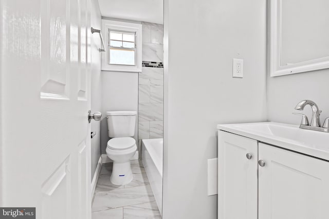 full bathroom with vanity, toilet, and tiled shower / bath