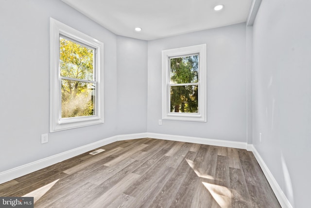 empty room featuring hardwood / wood-style floors