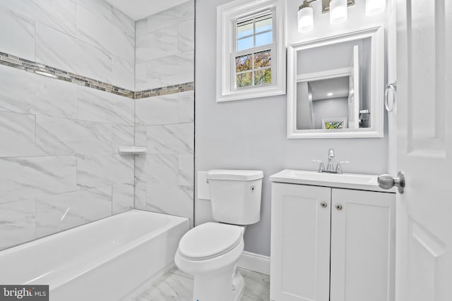 full bathroom with vanity, toilet, and tiled shower / bath combo