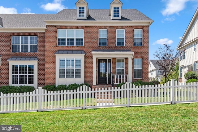 view of front of property with a front lawn