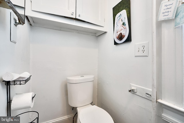 bathroom featuring toilet