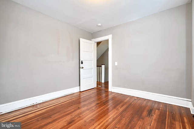 unfurnished room featuring wood-type flooring