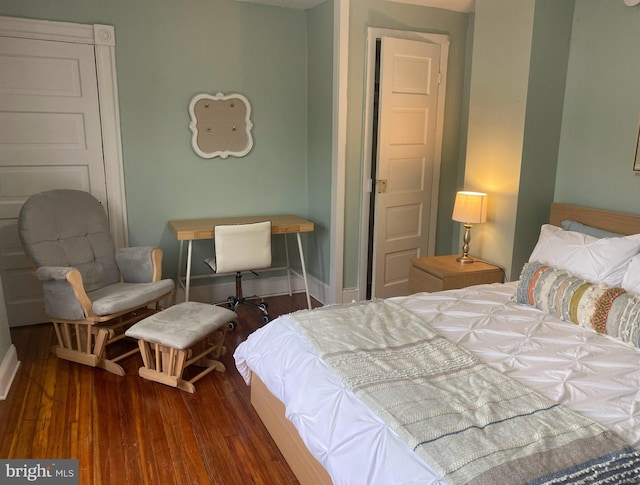 bedroom featuring wood-type flooring