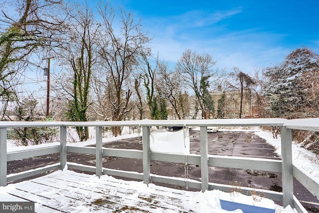 view of snow covered deck