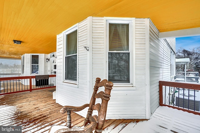 view of snow covered deck