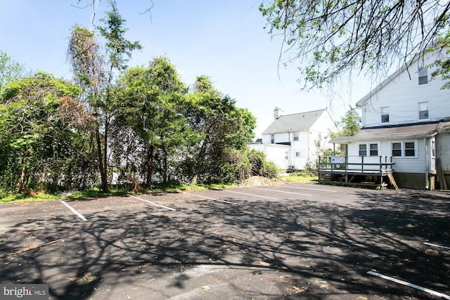 exterior space featuring a wooden deck