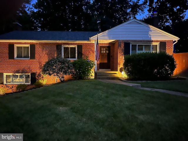 view of front of home with a front lawn