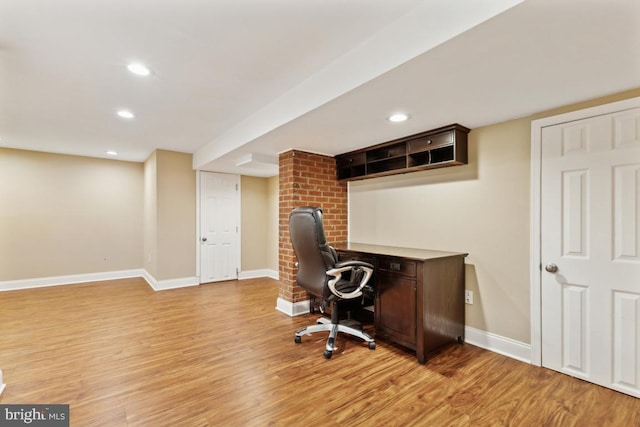 office area with light wood-type flooring