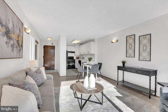 living room with hardwood / wood-style floors