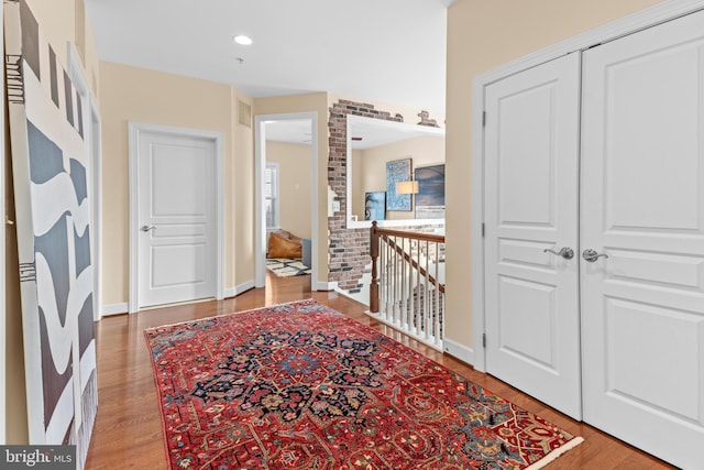 corridor featuring light hardwood / wood-style flooring