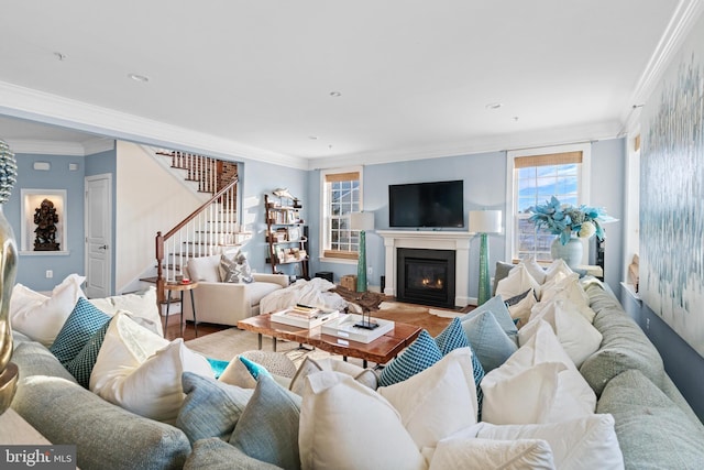 living room featuring crown molding