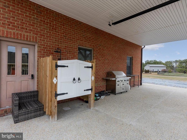 view of patio with area for grilling