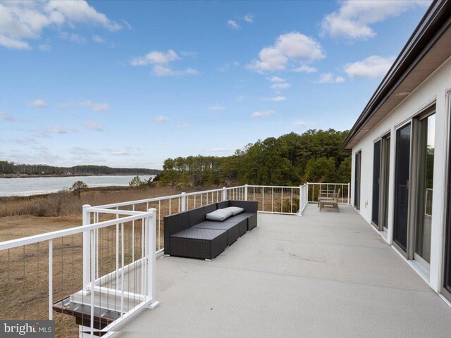 view of patio / terrace with a water view