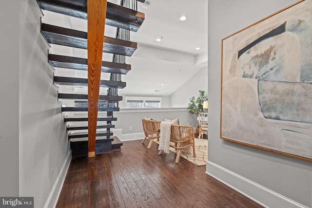 staircase featuring hardwood / wood-style floors