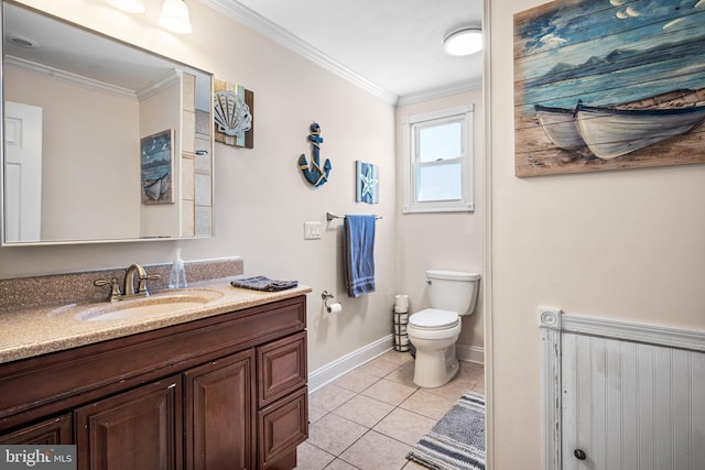 bathroom with vanity, tile patterned floors, ornamental molding, and toilet