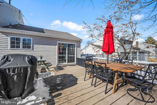 wooden deck featuring grilling area