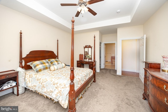 226 Loyal Dr, Mechanicsburg, PA 17050 - bedroom featuring light colored carpet, a tray ceiling, ceiling fan, and baseboards