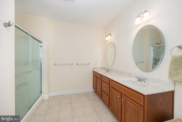 226 Loyal Dr, Mechanicsburg, PA 17050 - full bath with double vanity, a shower with door, tile patterned flooring, and baseboards