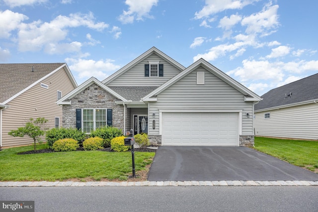 226 Loyal Dr, Mechanicsburg, PA 17050 - traditional-style home with stone siding, asphalt driveway, a front lawn, and a garage