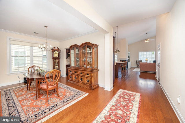 226 Loyal Dr, Mechanicsburg, PA 17050 - dining area featuring a chandelier, a ceiling fan, hardwood / wood-style flooring, and baseboards