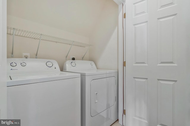 washroom featuring independent washer and dryer