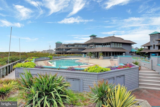 view of pool with a patio area