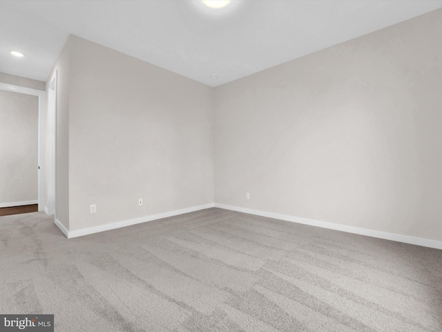 unfurnished room with carpet