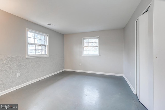 unfurnished bedroom with a closet