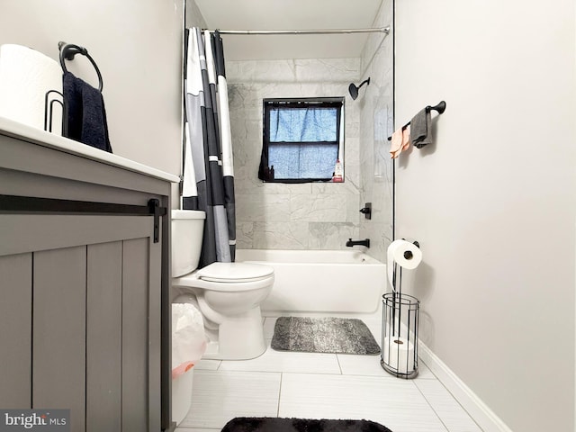 bathroom featuring toilet, tile patterned flooring, and shower / bath combo