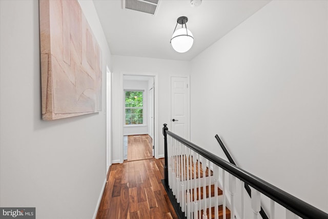 2518 S Walter Reed Dr Unit B, Arlington, VA 22206 - hall featuring an upstairs landing, wood finished floors, and baseboards