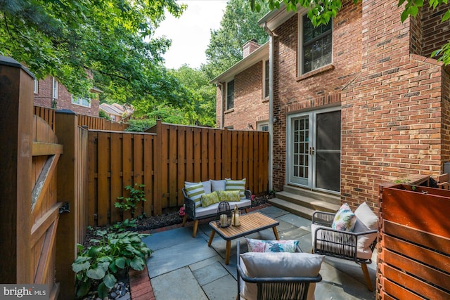 2518 S Walter Reed Dr Unit B, Arlington, VA 22206 - fenced backyard with an outdoor hangout area, entry steps, and a patio