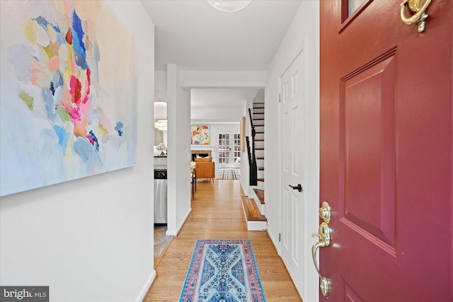 2518 S Walter Reed Dr Unit B, Arlington, VA 22206 - corridor featuring stairs, light wood-style flooring, and baseboards
