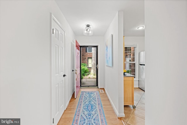 2518 S Walter Reed Dr Unit B, Arlington, VA 22206 - doorway to outside with baseboards and light wood-style floors