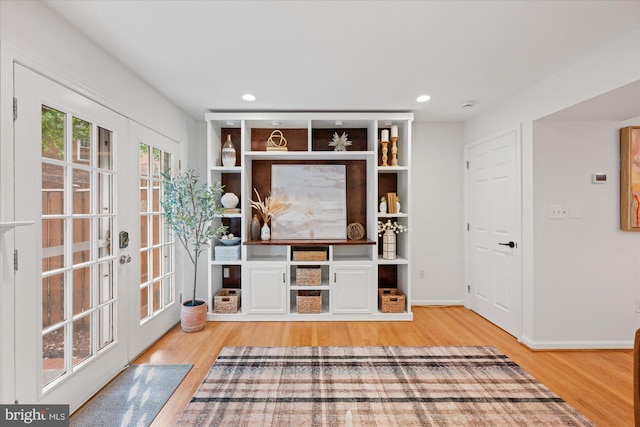 2518 S Walter Reed Dr Unit B, Arlington, VA 22206 - unfurnished living room featuring light wood-style flooring, recessed lighting, and baseboards